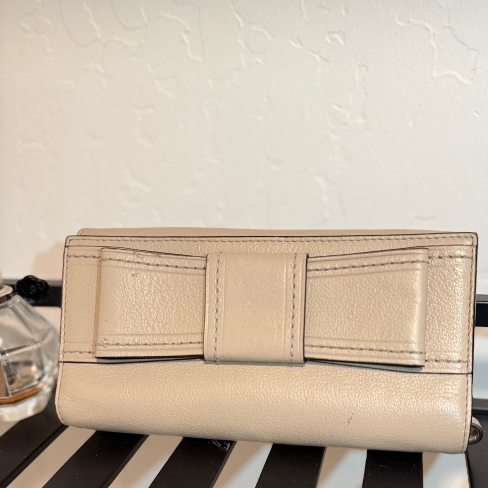 Kate Spade Nude “Mara”Leather Wallet Wristlet w Structured Bow Retractable Strap